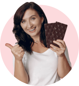 a woman with two chocolates